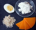 Natural source of vitamin B2 Ã¢â¬â egg, oatmeal, cheese Royalty Free Stock Photo